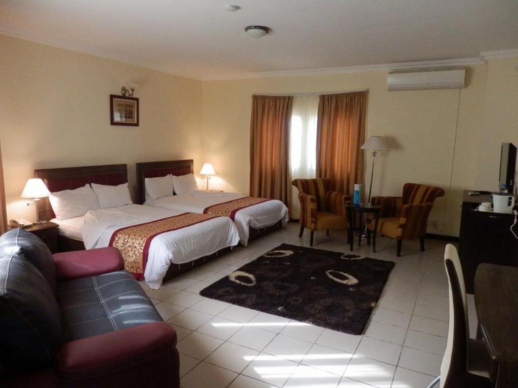 Blue Lodge Hotel Lagos Rom bilde
